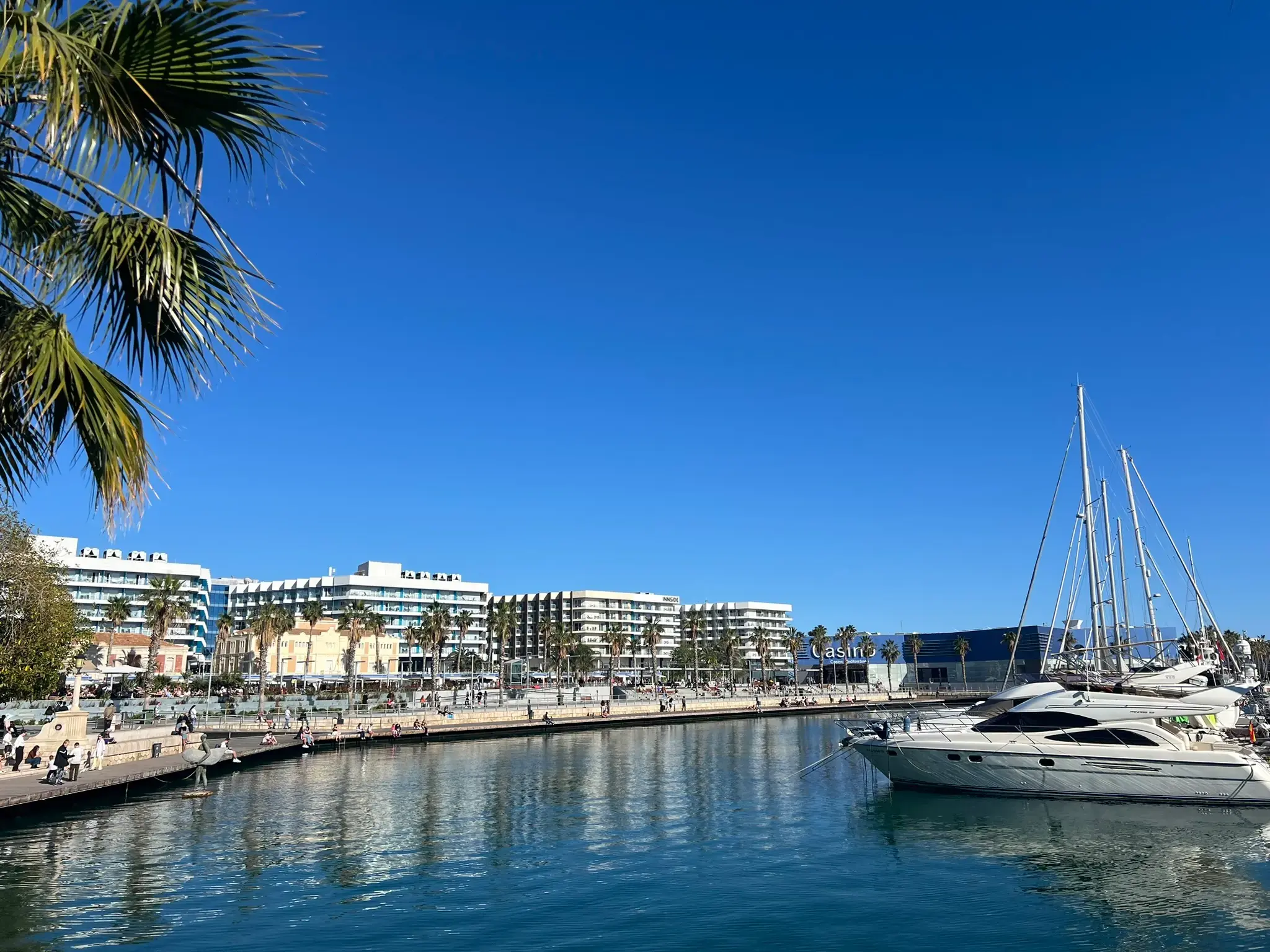 Casino Mediterráneo and luxury yachts at Alicante Marina