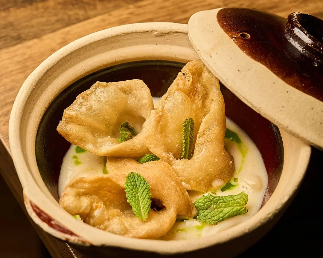 Pork ear dish at Koiné Bistró