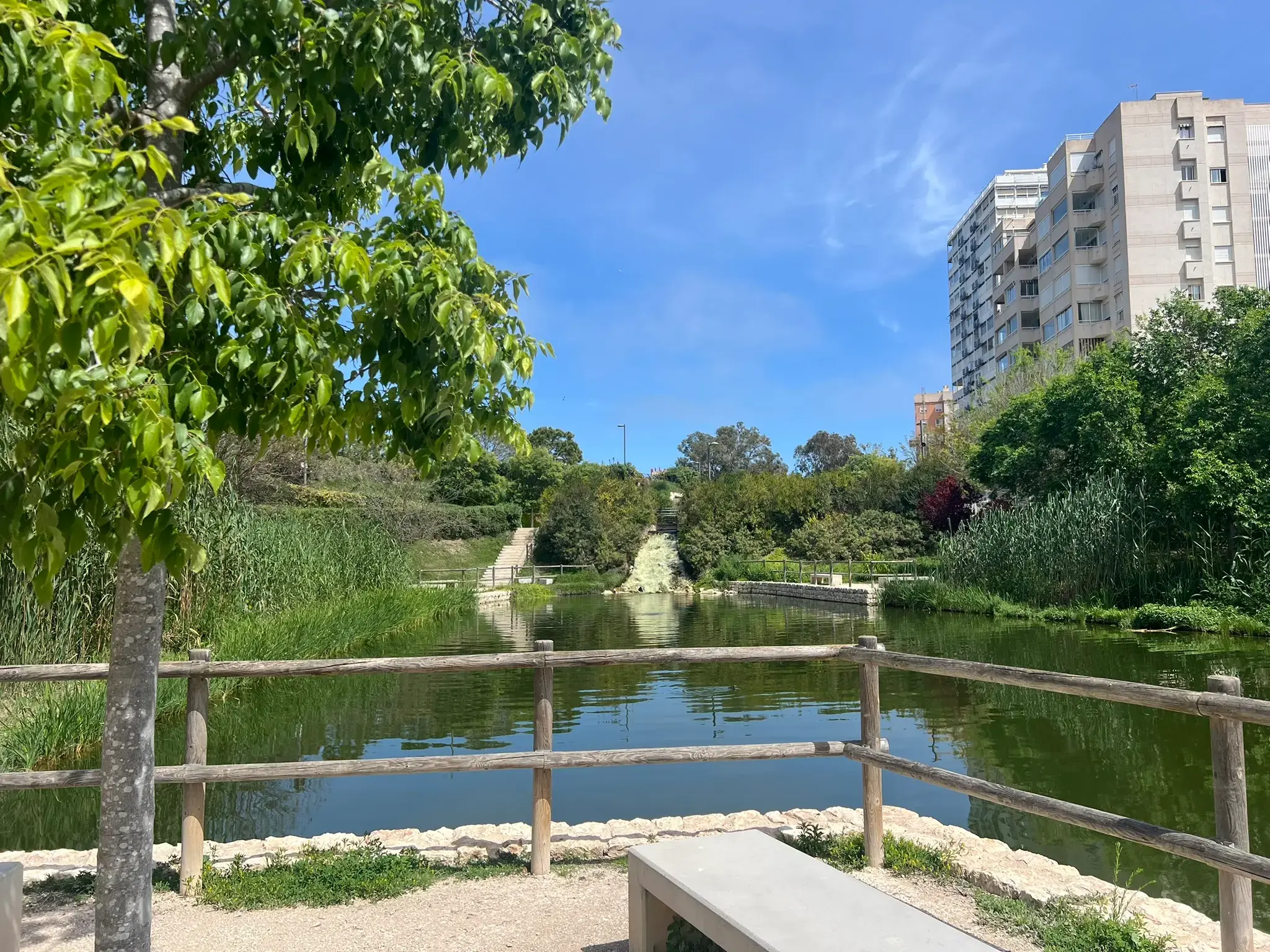 Close-up view of the waterfall feature at Parque La Marjal Alicante.